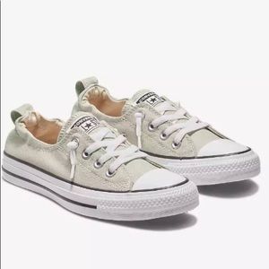 Grey slip on Converse sneakers